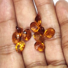 Madeira citrine 8x6mm oval concave cut 1.23 cts